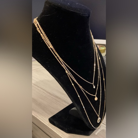 Gold Layered Necklace Set with Delicate Chains and Pendants - Picture 3 of 4